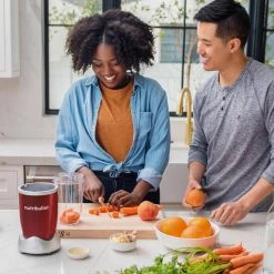 NutriBullet Pro 32 oz. Single Speed Red Blender with 24 oz. Cup and Lids -Air Fryers shop red nutribullet countertop blenders nb9 0901r 1f 1000